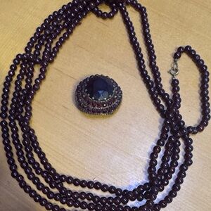 Antique Czechoslovakian red glass garnet tiered pin/brooch with hand strung neck